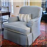 F01. Pair of swivel chairs with custom upholstery. 36”h x 32”w x 38”d 